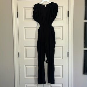 H&M black romper. Size medium. Cutouts on sides.